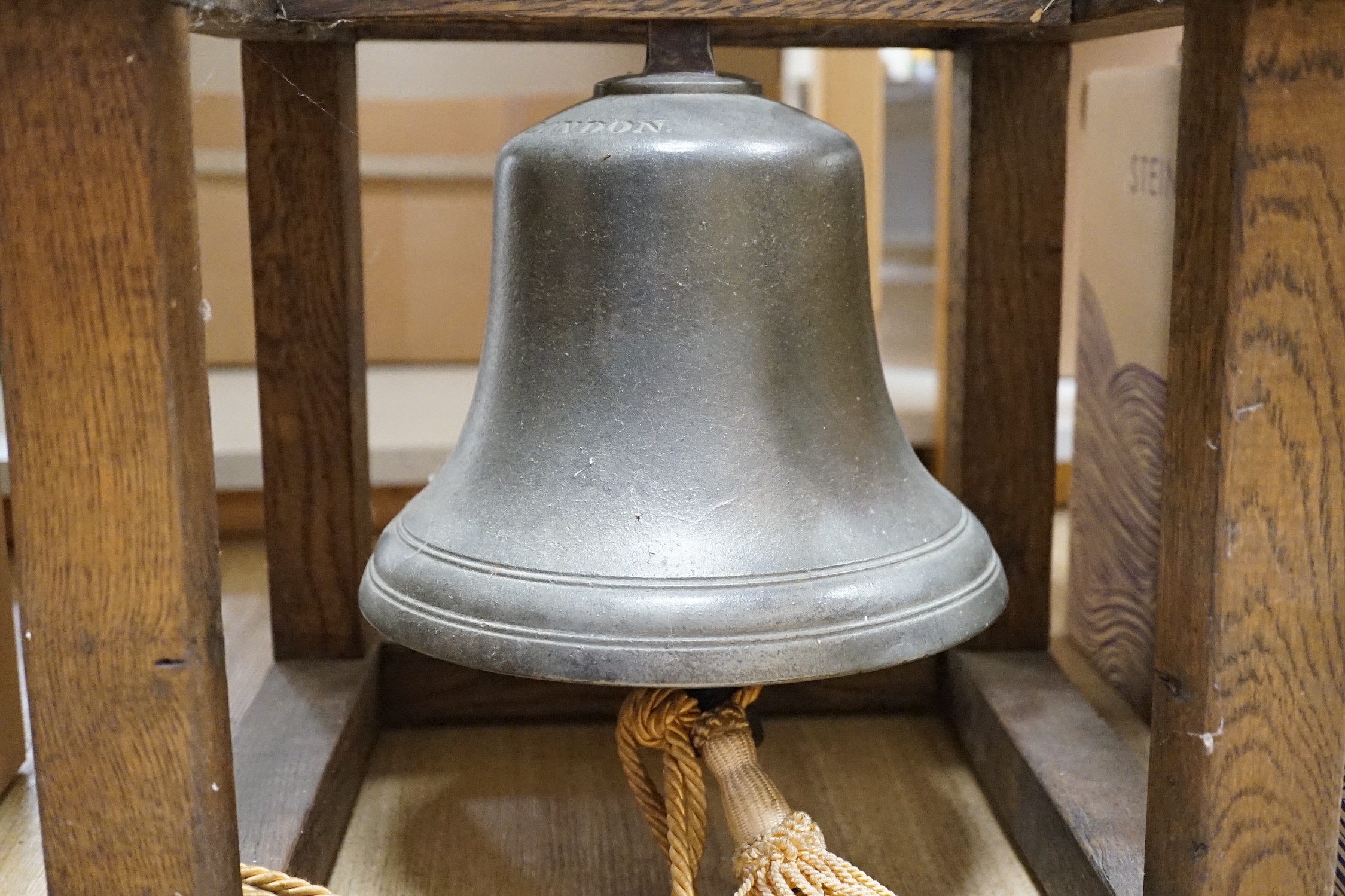 A large oak-framed 9.5in bronze bell, Mears & Co, London